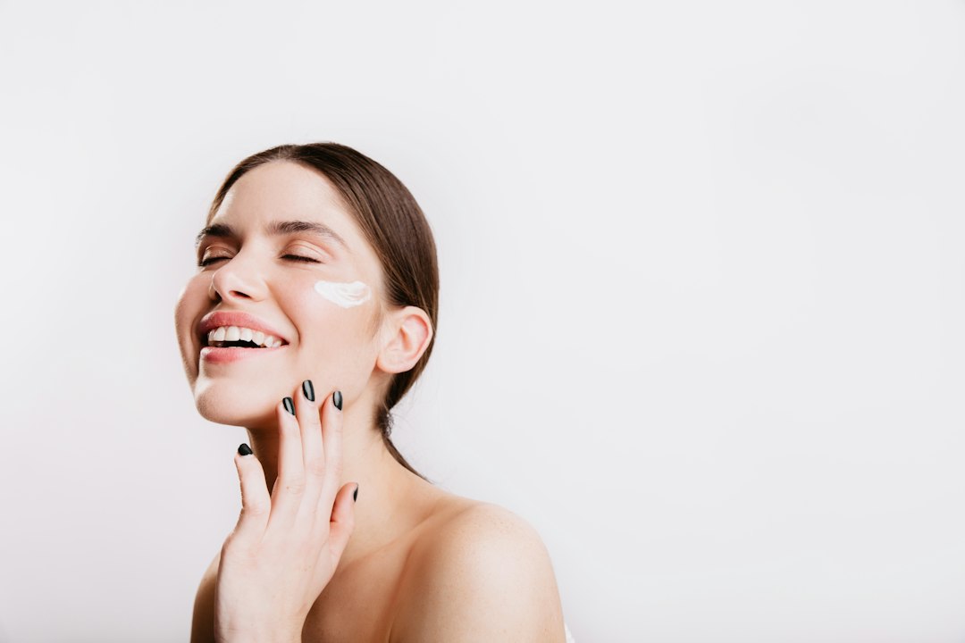Woman with hydrated-looking skin for a fall K-beauty barrier cream routine