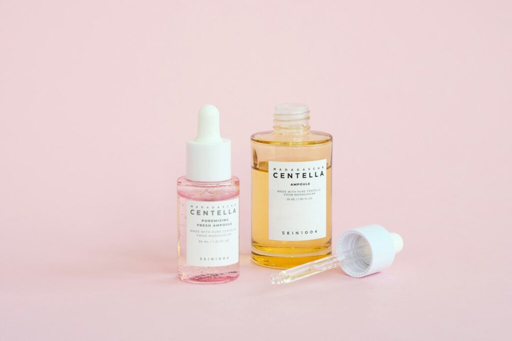 Pink skincare serum bottles representing the 2026 PDRN K-beauty skincare trend