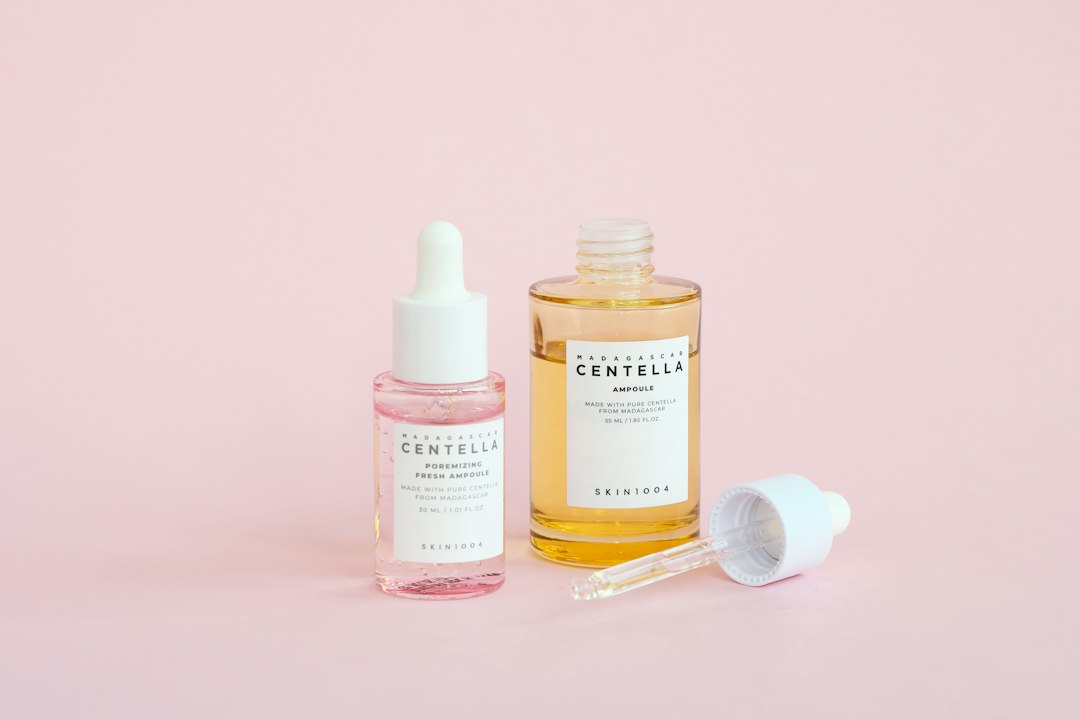 Pink skincare serum bottles representing the 2026 PDRN K-beauty skincare trend